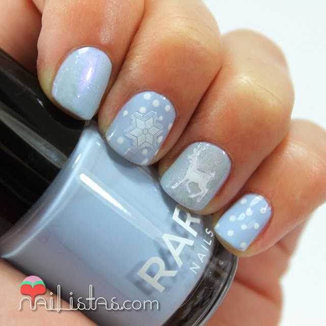Uñas decoradas con ciervos, estrella polar y copos de nieve Uñas decoradas con ciervos, estrella polar y copos de nieve